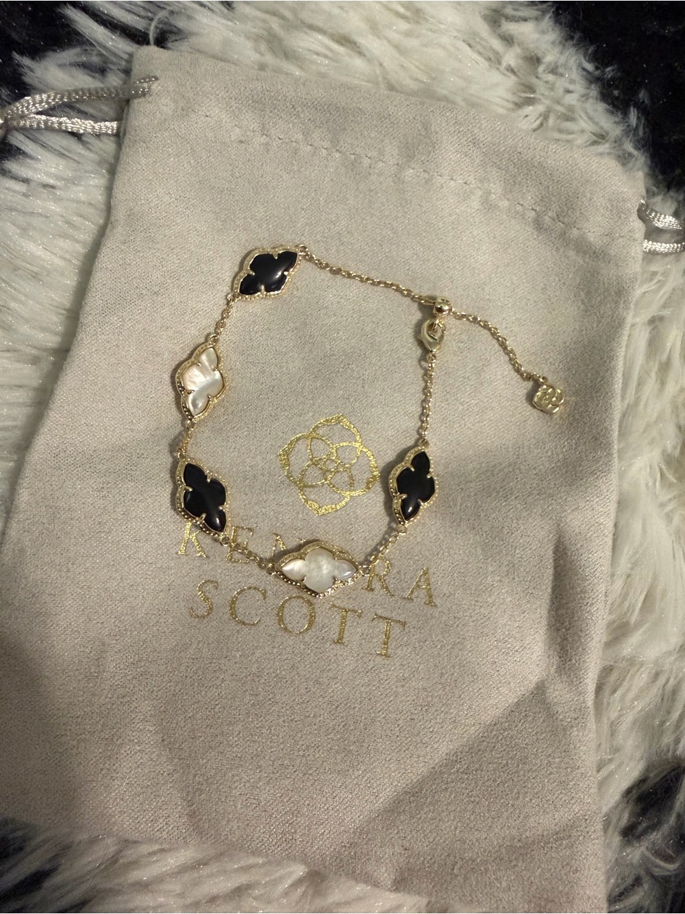 Kendra Scott Gold Bracelet with Black and White Clover Stones - Picture 2 of 4